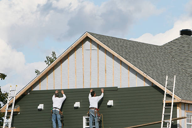 Professional Siding Installation technician working in Brownsville, OR